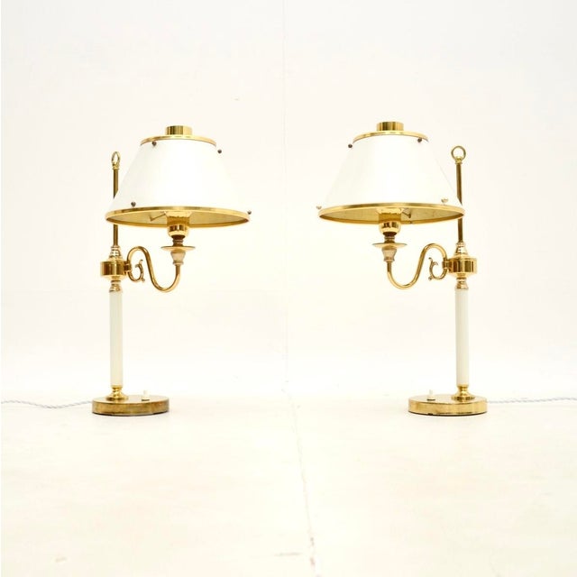 A smart and stylish pair of vintage Swedish brass and tole table lamps by Borens. We have recently imported them directly...