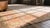 Pretty Yellow Color and Pink Border Doubled Palmettes Floral Design Antique Indian Agra Rug For Sale In New York - Image 6 of 8
