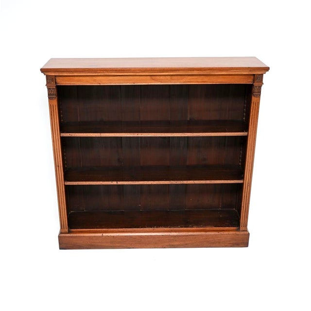 A charming and extremely well made antique Victorian open bookcase. This was made in England, it dates from around the...