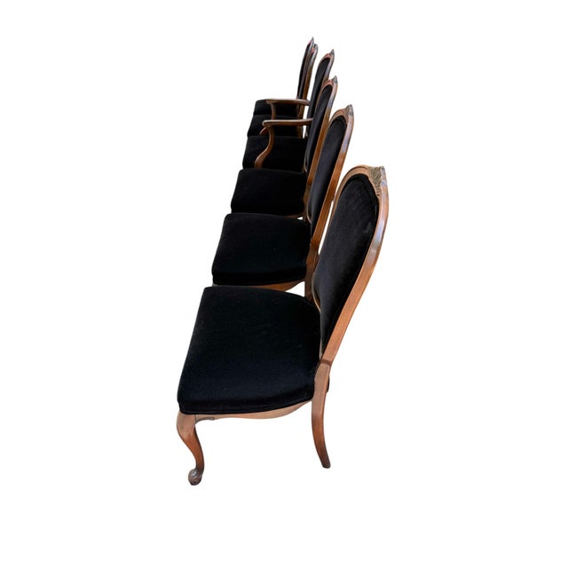 Set of Six French Provincial Chairs With Black Velvet Upholstery Five of the chairs are armless and one has arms. The...