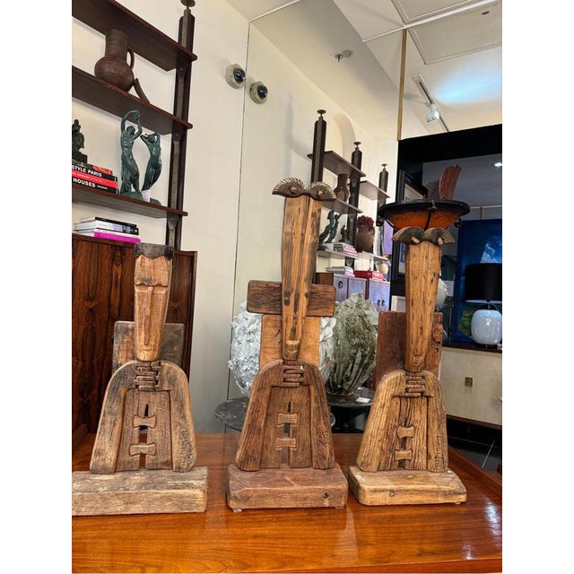 An extraordinary set of three carvings created from recycled wood from antique furniture by the acclaimed Italian artist...