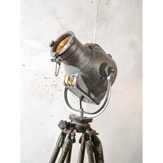 A strand electric patt 23 spotlight from the 1960s, stripped of its paint and bead blasted to raw aluminium, mounted on a...