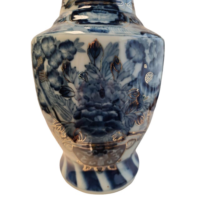 Beautiful 20th century Chinese export large blue and white vase with gilt trimming throughout in excellent condition....