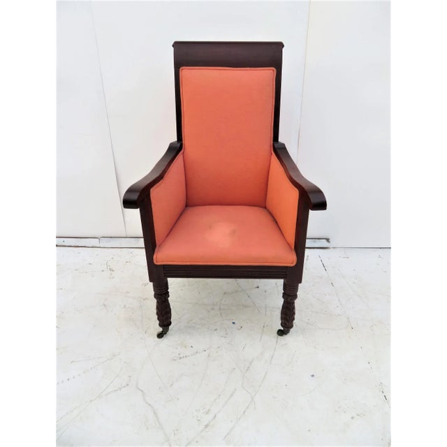 19th Century Mahogany Empire Arm Chair with acanthus carved legs brass cap castors, light stain on seat, seat height 18".