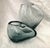 Beautiful smoked teal glass vases, thick glass. Great on a console table or entry way. 10.5in h x 5in d x 8.5in w 6in h x...