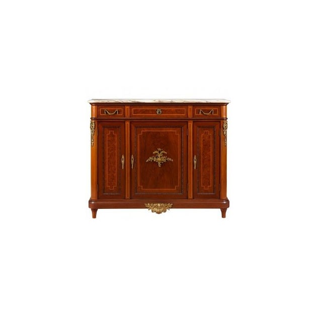 A Louis XVI style side cabinet (meuble d'appui) in mahogany with burl-veneered panels and fine inlaid stringing. Three...