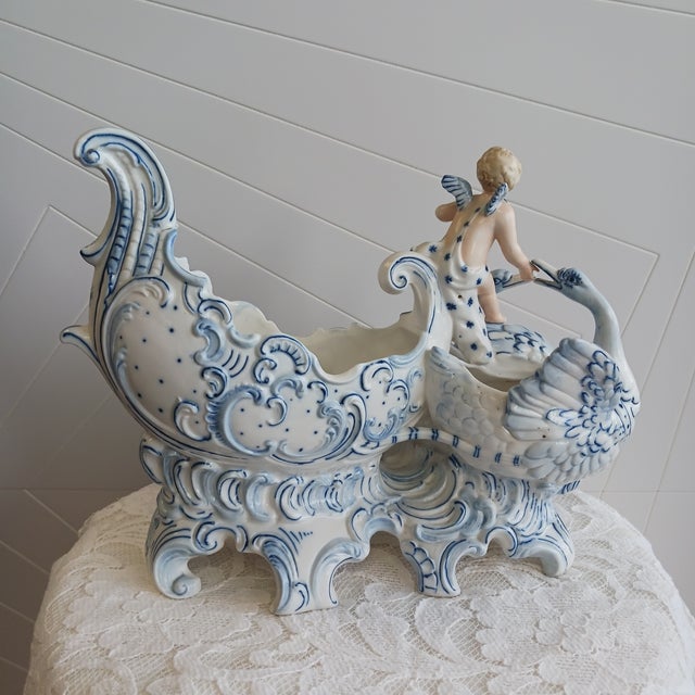 A magnificent 10-inch German bisque centerpiece produced by Royal Rudolstadt (Straus & Sons) circa 1895. This rare...