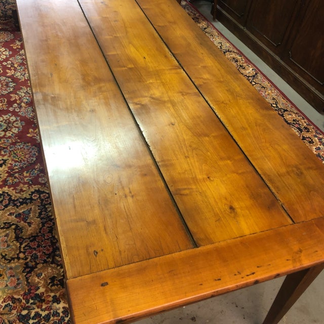 Great quality mid 19thc cherry French farm table 3 plank top breadboard ends