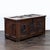 This antique wooden trunk features beautiful, hand-carved Gothic panels on the front. The sturdy lid opens smoothly,...
