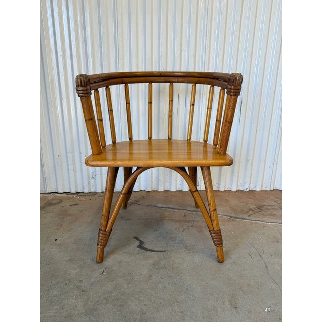 Elevate your home decor with this exquisite set of two vintage Heywood Wakefield captains chairs from the renowned...