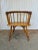 Elevate your home decor with this exquisite set of two vintage Heywood Wakefield captains chairs from the renowned...
