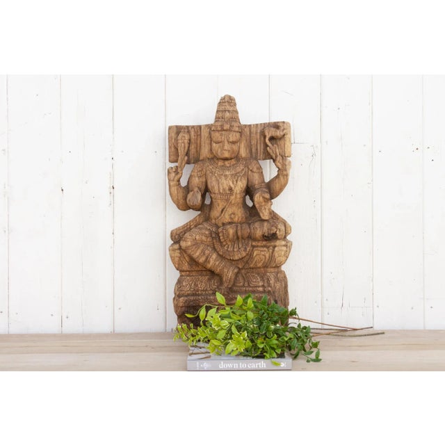 Breathtaking 18th century carved wooden Vishnu statue. This statue of Vishnu the Hindu preserver of creations is finely...