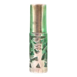 Spray-Shaped Perfume Bottle with Cut-Out Silver Structure and Glass Core For Sale
