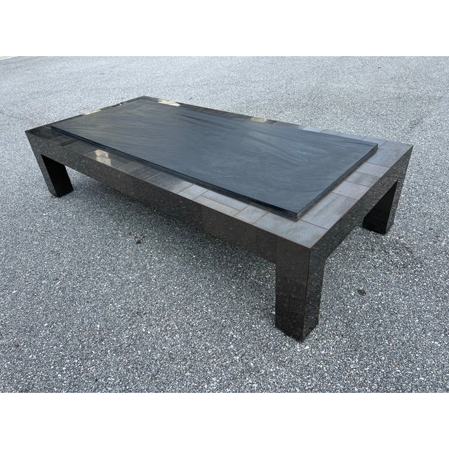 Looking for a coffee table that’s more than just furniture-- well this is a functional work of art. This Paul Evans...