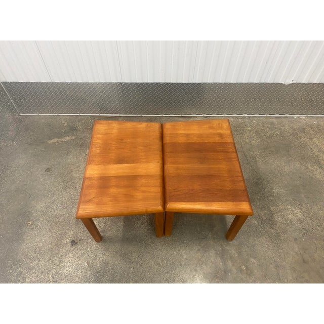 Set of teak coffee table and sides table made in Denmark , One rectangular coffee table square legs and two sides tables...