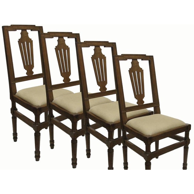 Four antique walnut chairs from the late 19th century, Piedmontese, made of blond walnut. They are in excellent condition....
