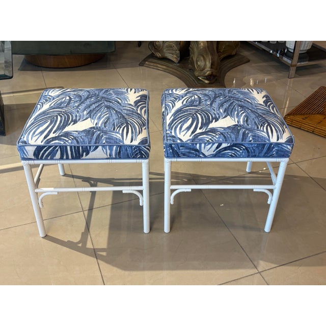 Vintage pair of 1970s faux bamboo metal benches, ottomans, footstools, stools. These have been newly powder-coated in a...