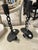 This distinctive pair of mid-century French candlesticks features a striking chain-link design crafted in black iron,...