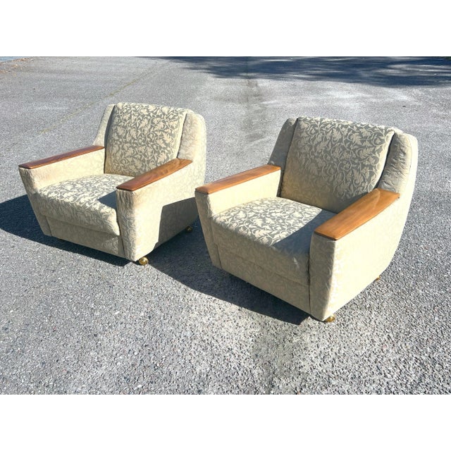 Purchased from original owners who had them reupholstered around 2012 in designer fabric. These low slung lounge chairs...