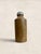 A charming late 19th to early 20th century English stoneware ginger beer bottle embossed "R. White" with the maker's mark...