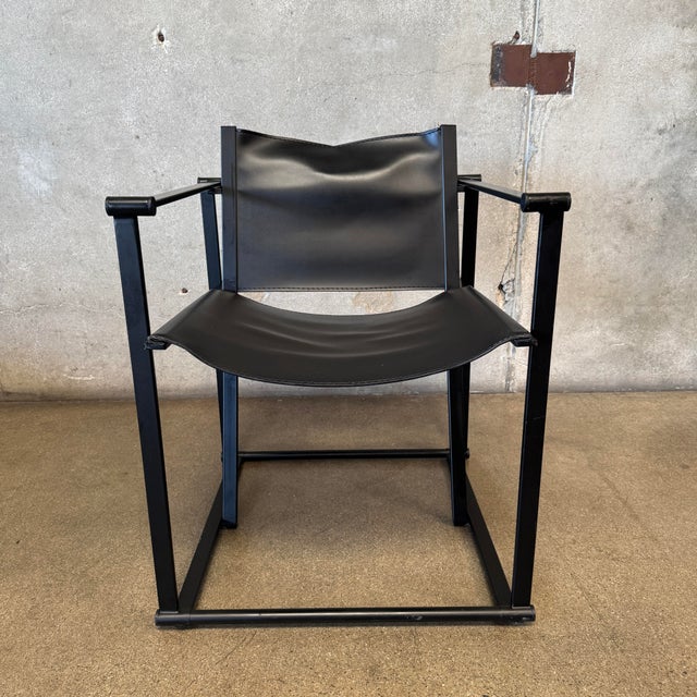 An iconic piece of Dutch architectural minimalism, this postmodern "Kubus" (Cube) FM60 armchair was designed by Radboud...