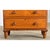 This English chest of drawers from the 19th Century is built from solid pine with a faux bois finish to imitate oak. The...