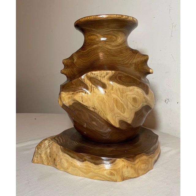 This modern handmade wooden vase comes with a matching base, making it a perfect addition to any home decor. The glossy...