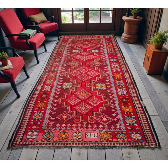 This exceptional 1945-dated Artvin kilim runner serves as a rare example of Eastern Black Sea textile art, bridging the...