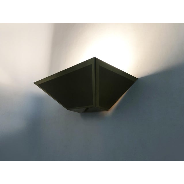 Pair of Gold Wall Sconces, 1980s Pair of gold wall sconces with upward lighting, dating from the 1980s. Stunning design....