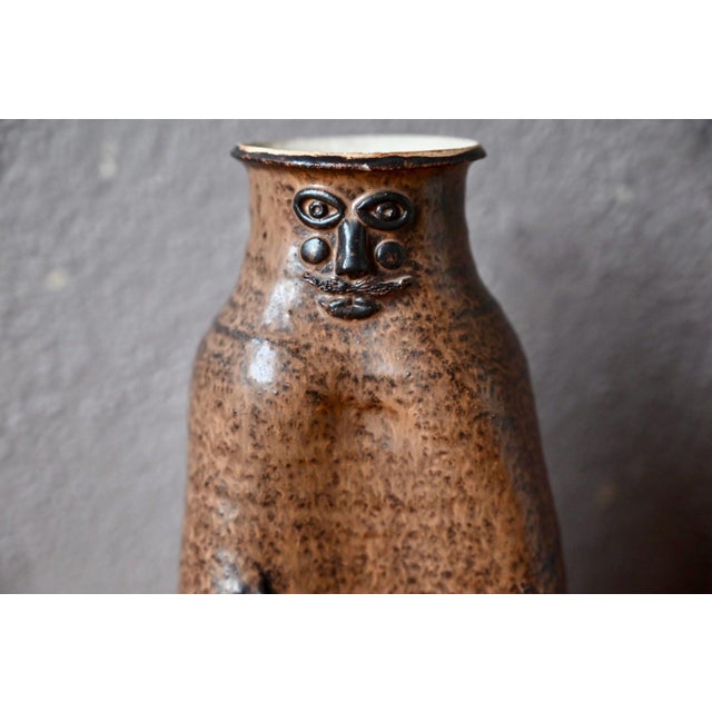 Here is a piece unlike any other: a glazed stoneware bottle vase, crafted by an artist's hands in the 1960s or 70s. Its...