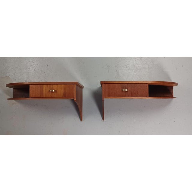 Set of two restored Danish floating teak nightstands from the 1950´s - 1960´s The nightstands are good examples of...