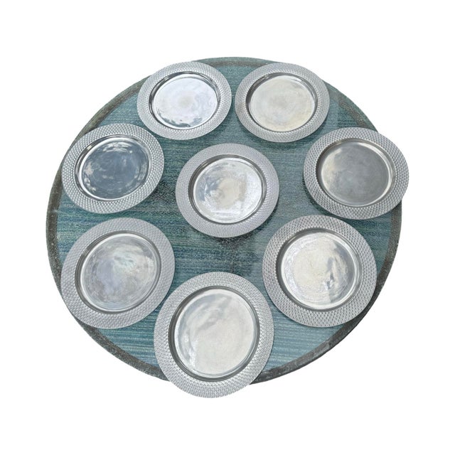 Witlon Armetale’s Polka Dot design, heavy 12.25” pewter platters that can be used as charger under plates or serving platers.