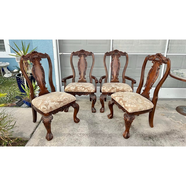 Vintage 1980s Set of 4 Large Hand Carved chairs. A solid wood foliate carvings, curved and scrolled arms, acanthus ball...