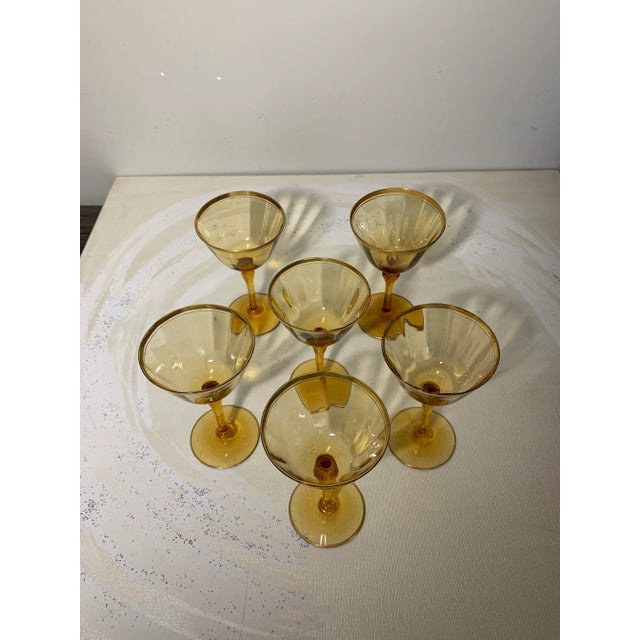 Delicate vintage amber glasses with gilt rim and band design. Perfect for sherry or sweet wines. No mark of the maker. In...