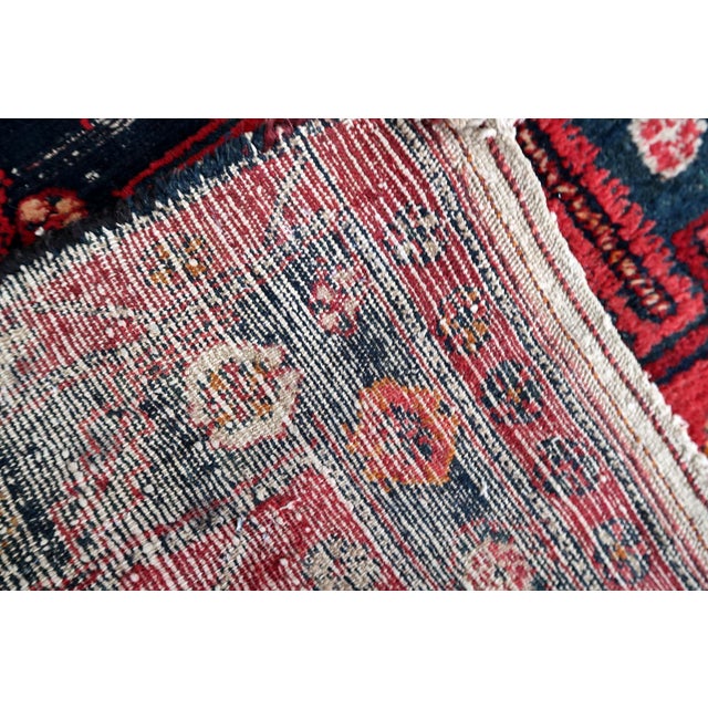 A Glimpse into History with our Antique Persian Hamadan Rug Transport your living space to a bygone era with our Handmade...