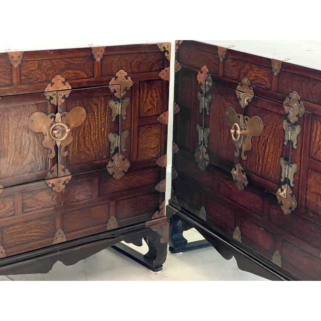 A vintage set of two 'stackable' Korean Joeson / Asian style dark brown Kayaki wood & brass nightstands. Lots of storage...