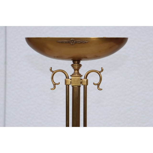 Amazing pair of 1980's Torchiere brass Italian floor lamps by LaRelco, in vintage original condition, with some wear and...