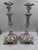 A highly decorative pair of Baroque Revival candlesticks, distinguished by their sculptural form and richly modeled...