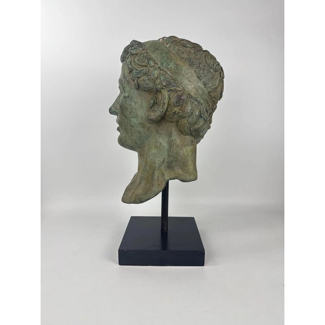 A striking hollow cast bronze male head inspired by the portrait sculpture of Greco-Roman antiquity. Beautifully modeled...