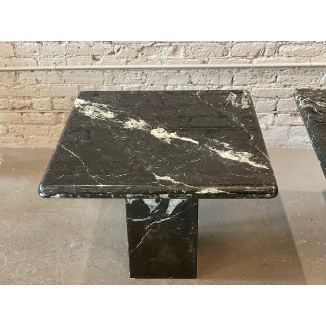 Beautiful pair of Nero Marquina tables. Absolutely love the veining. The original lacquer is in excellent condition.