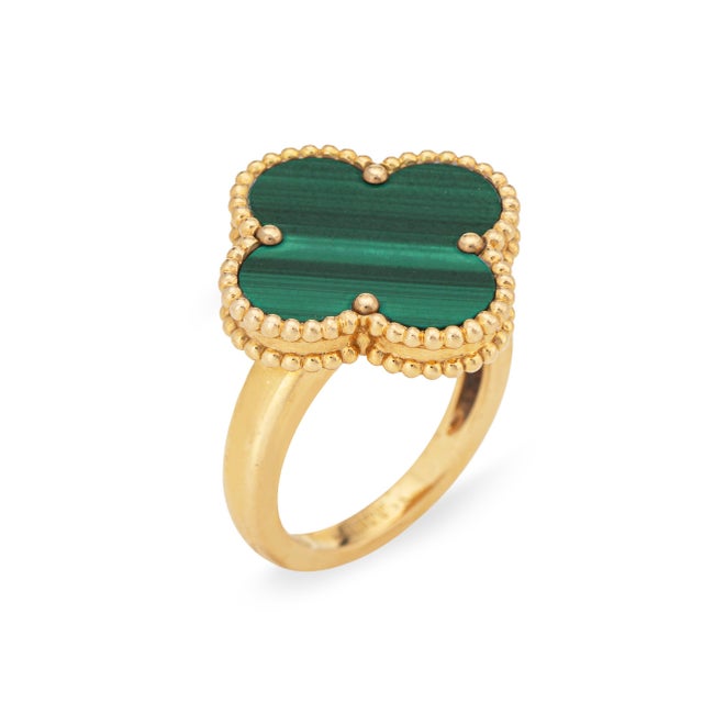 Pre-owned Van Cleef & Arpels Magic Alhambra malachite ring (circa 2010s). Malachite measures approx. 18mm. The stylish...