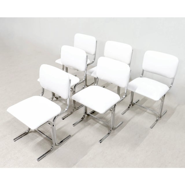 Vintage Italian Chrome-Plated Metal Chairs with White Leather Seats, 1970s, Set of 6, in Very Good conditions. Designed...