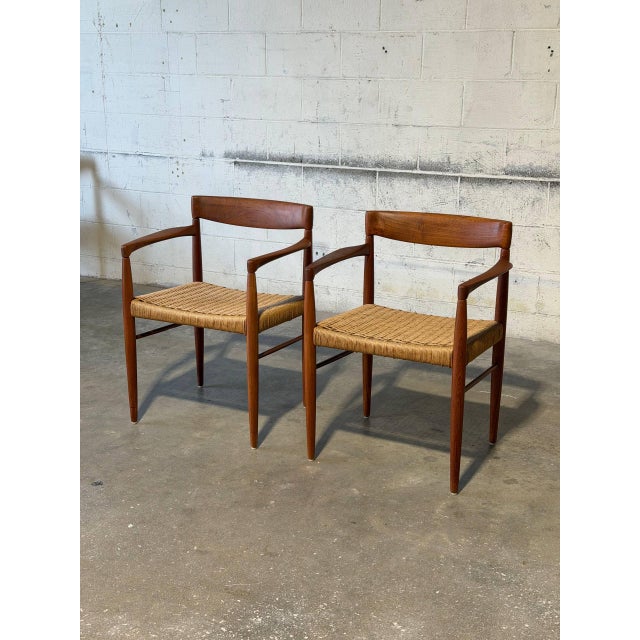 These dining armchairs feature a sculpted organic form with elegantly sweeping lines and refined armrests. Their...