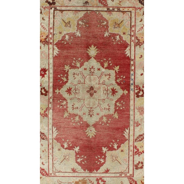 Mid 20th Century Mid 20th Century Red Field Vintage Turkish Oushak Rug With Geometric Medallion and Floral Motifs For Sale - Image 4 of 7