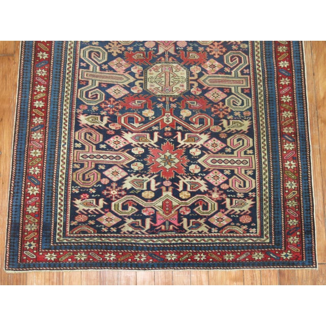 A geometric tribal looking Caucasian Shirvan rug from the late 19th century. Measures: 3'3” x 4'3” Antique Caucasian rugs...