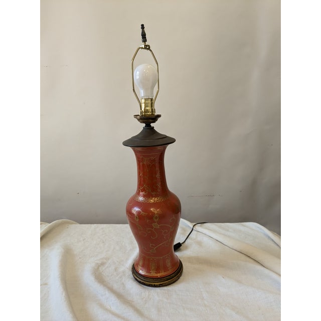 This hand painted lamp uses up to 100 Watt Edison base bulb, the height of the base is 17".