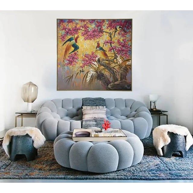 A large-scale signed Chinoiserie painting on stretched canvas depicting flowers and birds in beautiful vibrant colors with...