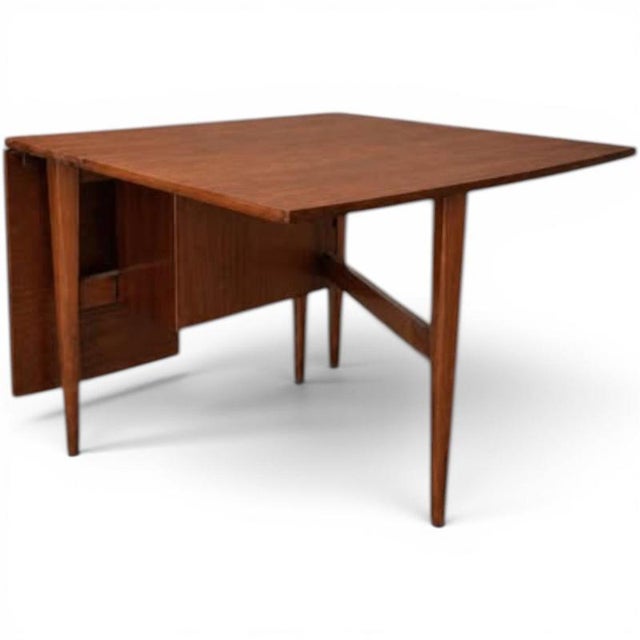 A practical and highly desirable piece of British mid-century furniture that combines beautiful design with everyday...