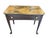 Charming vintage writing table or petite console featuring a slender dark-stained wood frame, elegant tapered legs and a...