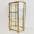 Vintage brass display cabinet slash display cabinet with glass windows. The glass display cabinet is in excellent vintage...